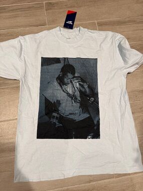 Reebok Men’s baby blue Short Sleeve Graphic Tee. Iverson graphic